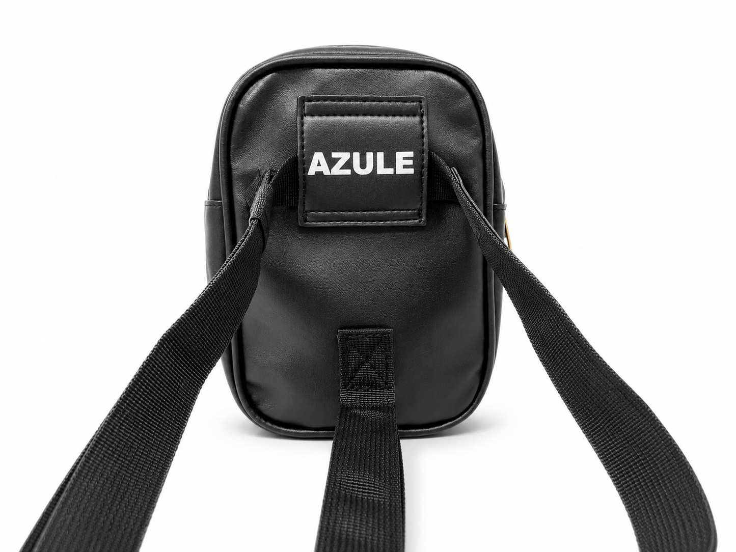 A black leather crossbody bag with a black webbing strap, featuring a front patch with the brand name 'AZULE' in white text, shot against a solid white background.