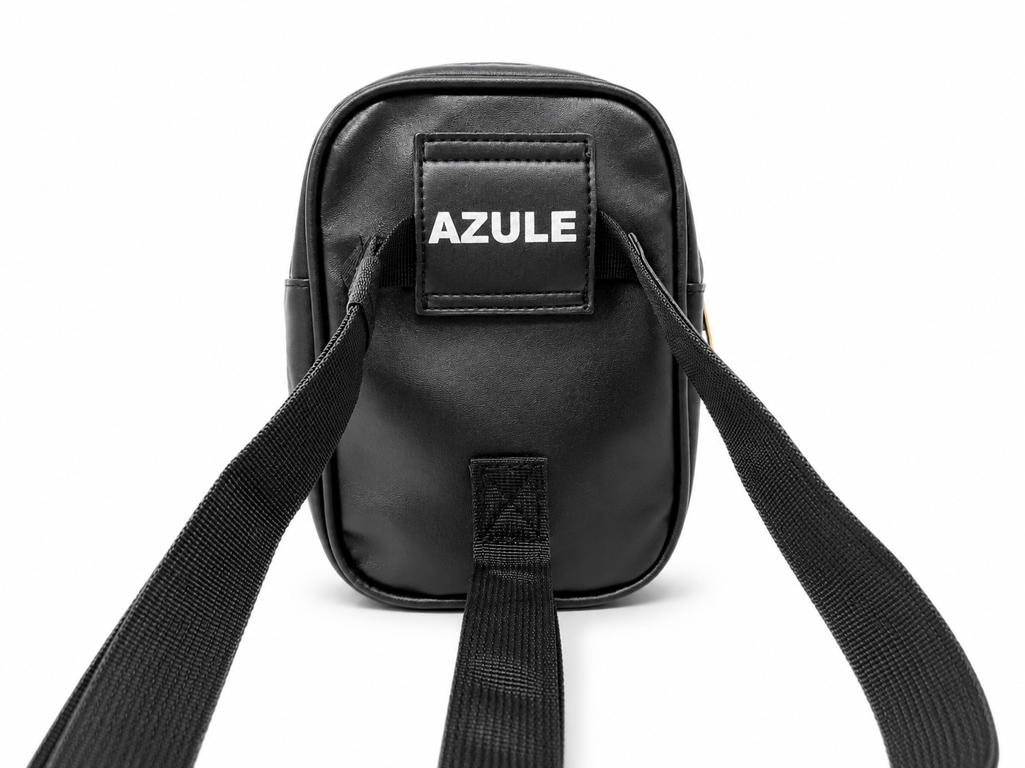 A black leather crossbody bag with a black webbing strap, featuring a front patch with the brand name 'AZULE' in white text, shot against a solid white background.