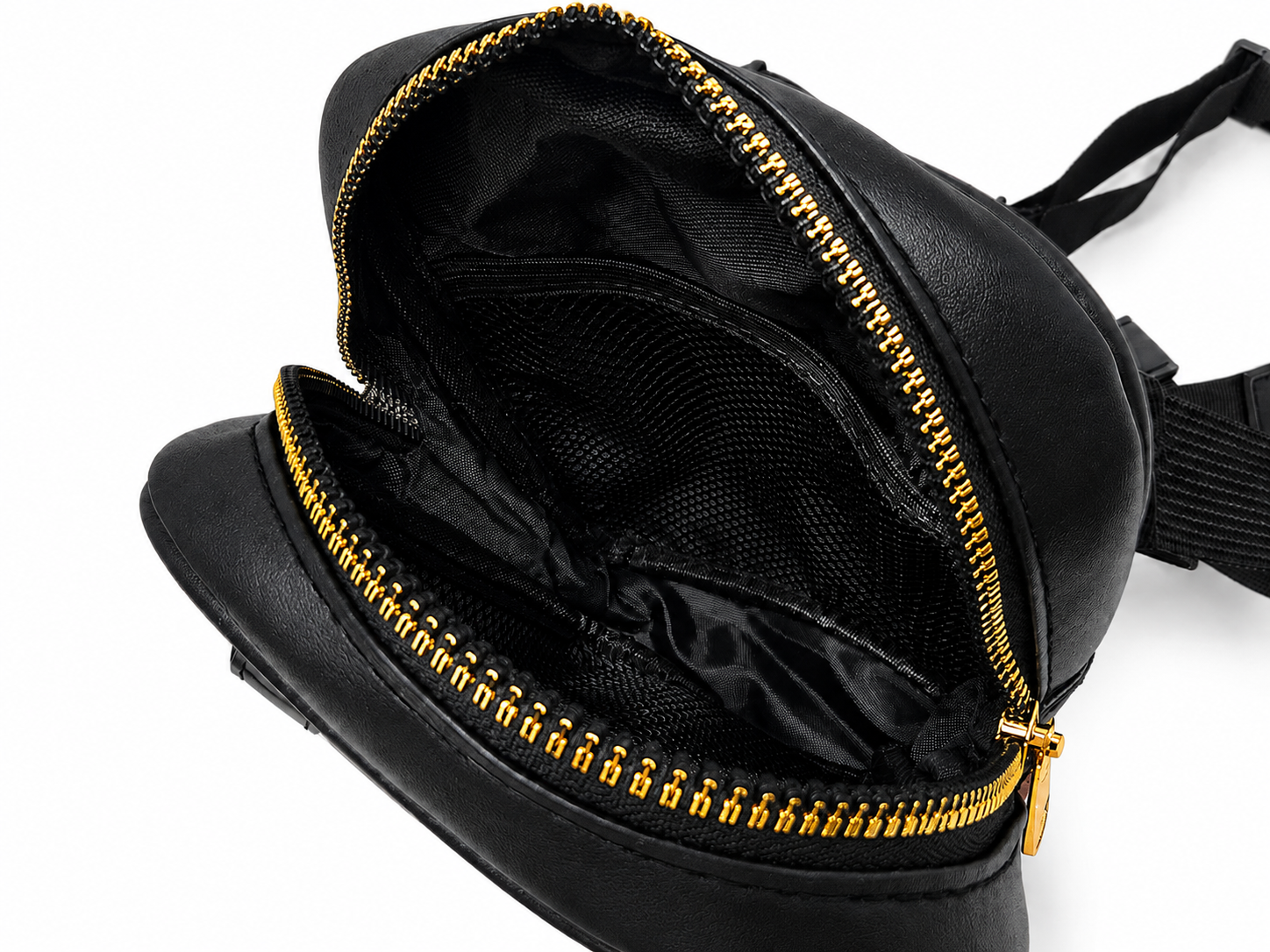 Black faux-leather crossbody bag shown open, revealing a black mesh interior and gold-tone zipper with a gold pull tab, on a white background.